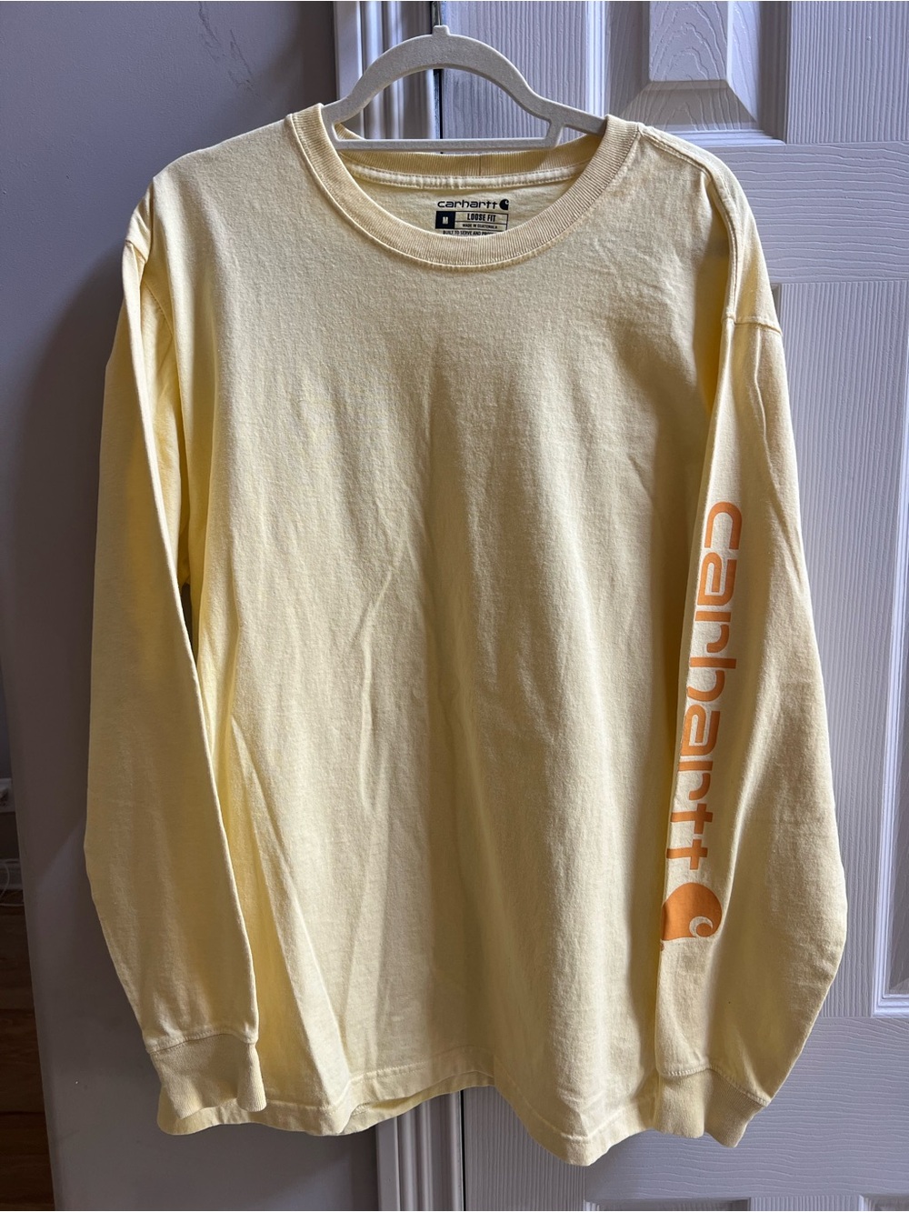 Carhartt Men’s Long-Sleeve Tee in Light Yellow with Orange Sleeve Logo